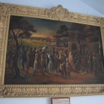 Šajā gleznā attēlots kārtējais Maharadžas varoņdarbs. Stāsts ir tāds - tā kā kaut kādu apstākļu dēļ (visticamāk neraža) cieminiekiem aptrūcies ēdiens, tāpēc Randžits vēlīgi noziedojis kaudzīti pārtikas, atļaujot katram iedzīvotājam paņemt tik, cik var panest. Tikmēr pats viltīgi pārģērbies par parasto mirstīgo un gājis vērot, kā visa sadale notiek. Kāds nabags paņēmis tik lielu maisu, ka nav varējis aiznest mājās, bet Randžits tā vietā, lai vīru sodītu (kas bija normālā prakse), paņēmis lielo maisu un aiznesis līdz pašām nabaga mājām. Es nezinu, kādu mesidžu viņš šādā veidā gribējis nosūtīt. Ņemt vairāk nekā tev pienākas, ir ok? Nu, nezinu. Bet aprakstiņā bija minēts, ka šis stāsts lieliski parāda Randžita Singha labsirdību.